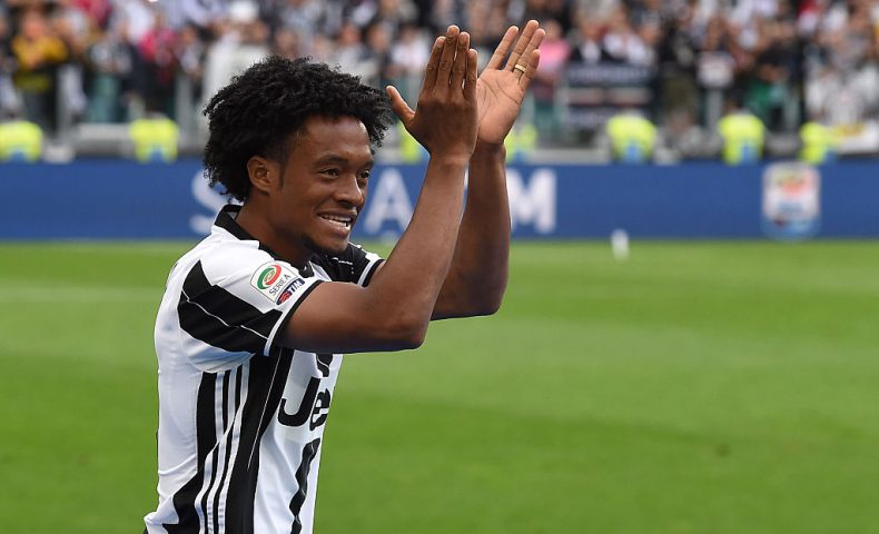 TURIN, ITALY - MAY 14:  Juan Cuadrado of Juventus FC celebrates after beating UC Sampdoria 5-0 to win the Serie A Championships after the Serie A match between Juventus FC and UC Sampdoria at Juventus Arena on May 14, 2016 in Turin, Italy.  (Photo by Valerio Pennicino/Getty Images)